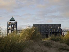 Strand mit Blick auf Haus des Gastes in Norden-Norddeich